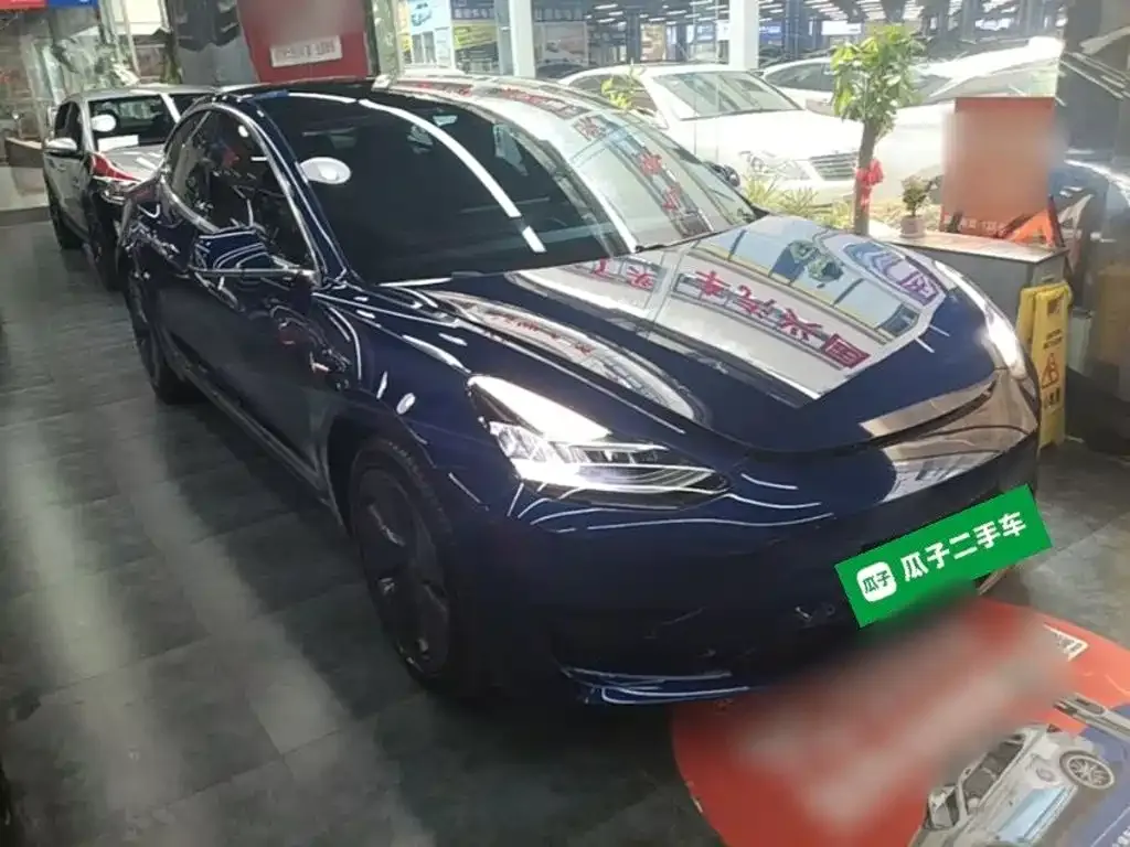 Tesla Model 3 — фото 10