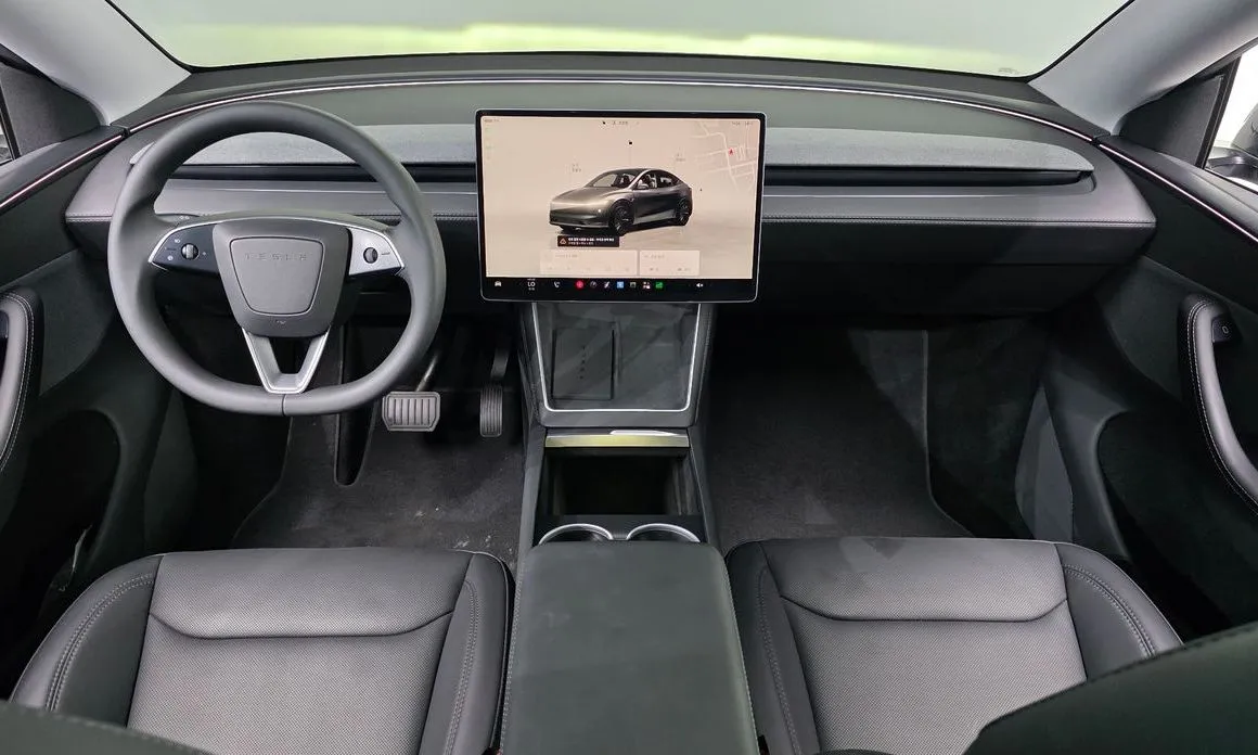 Tesla Model Y — фото 9