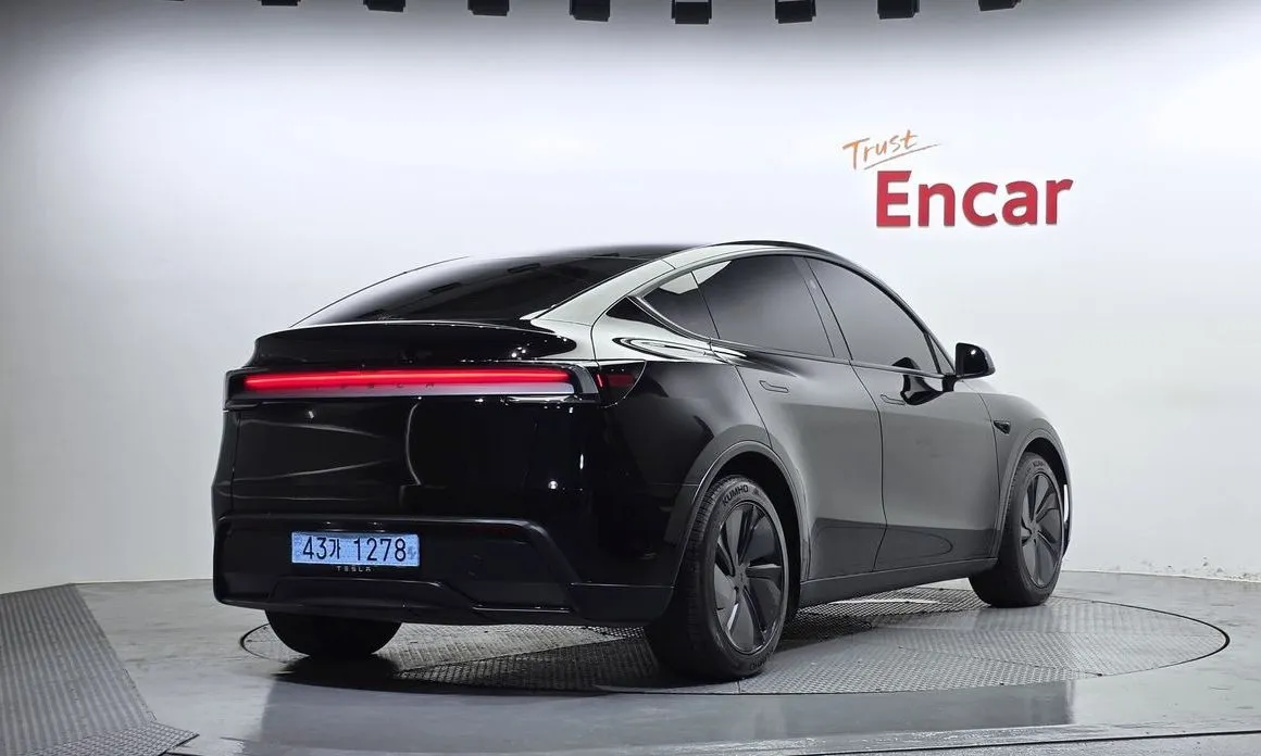 Tesla Model Y — фото 7