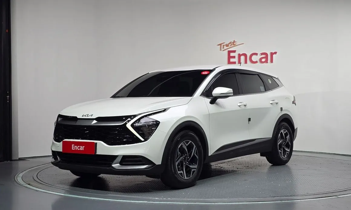 Kia Sportage — фото 1