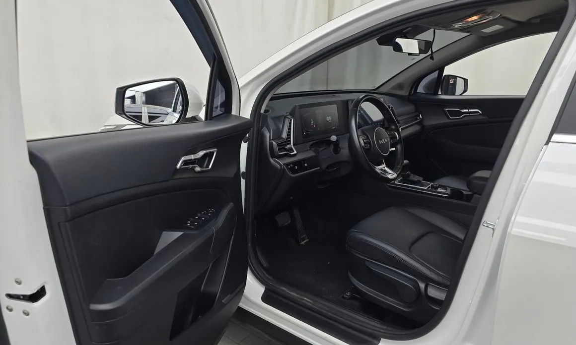 Kia Sportage — фото 8