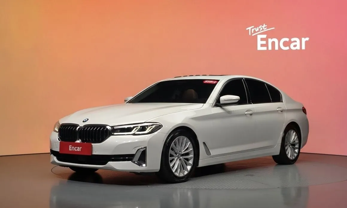 BMW 5-Series — фото 1