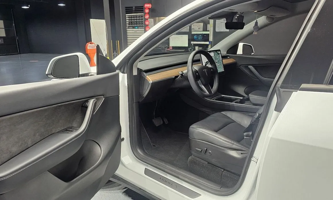 Tesla Model Y — фото 7
