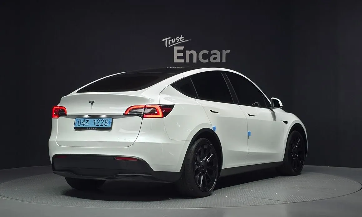Tesla Model Y — фото 7