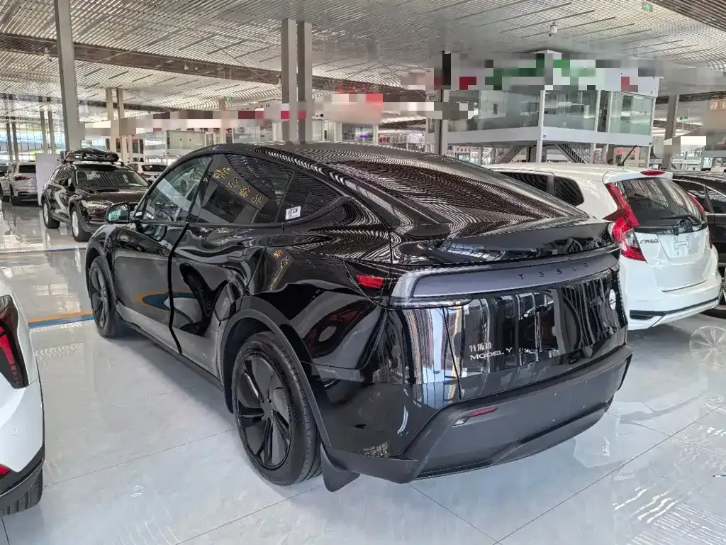 Tesla Model Y — фото 7