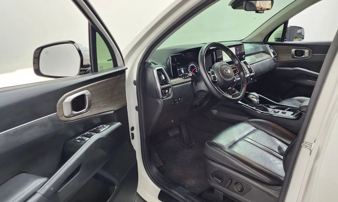 Kia Sorento — фото 7
