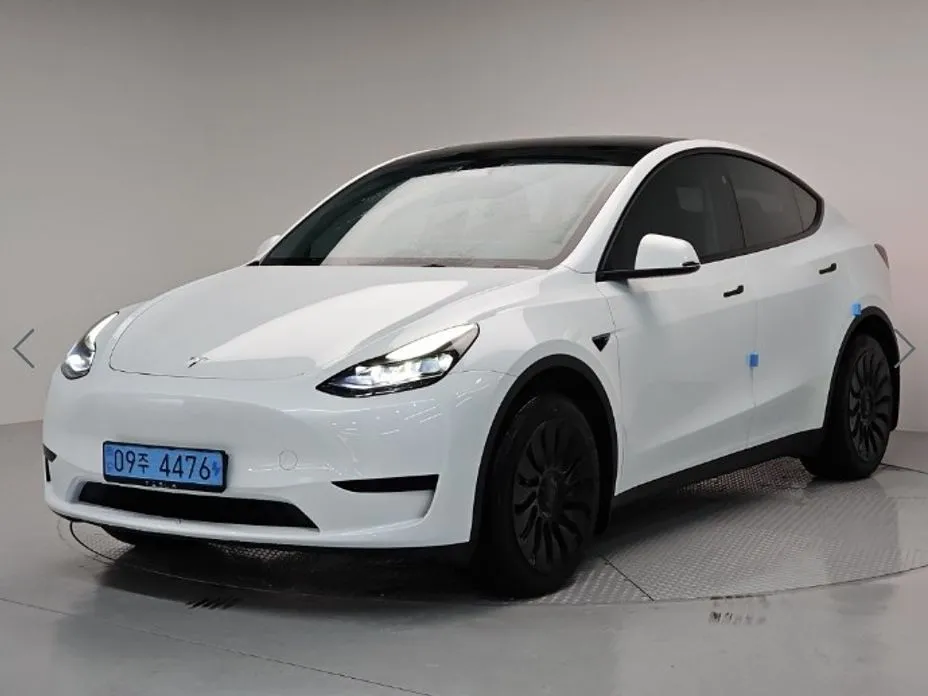 Tesla Model Y — фото 1