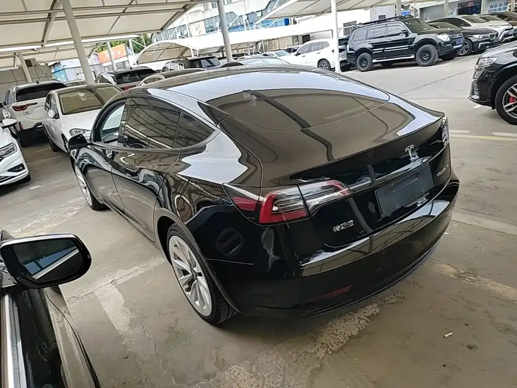 Tesla Model 3 — фото 10