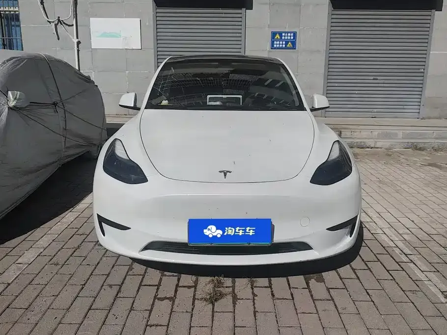 Tesla Model Y — фото 10