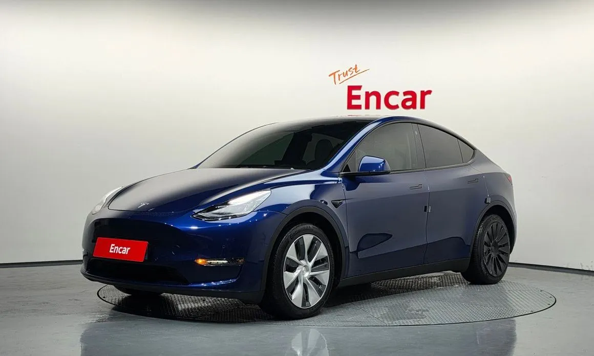 Tesla Model Y — фото 1