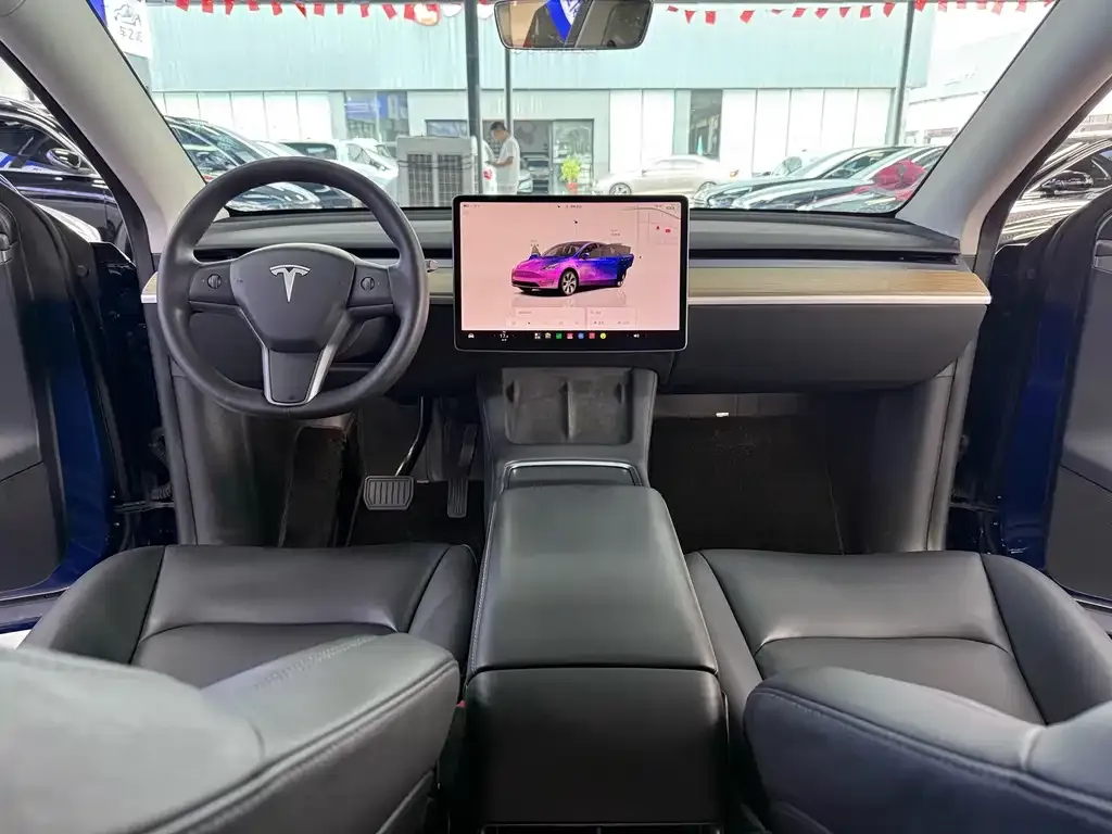 Tesla Model Y — фото 7