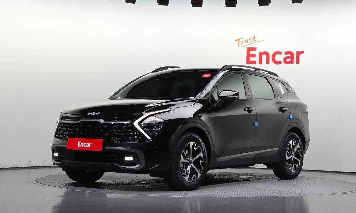 Kia Sportage — фото 1