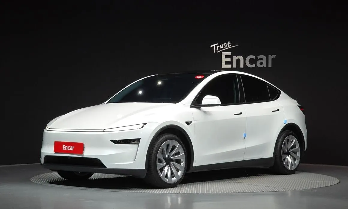 Tesla Model Y — фото 1
