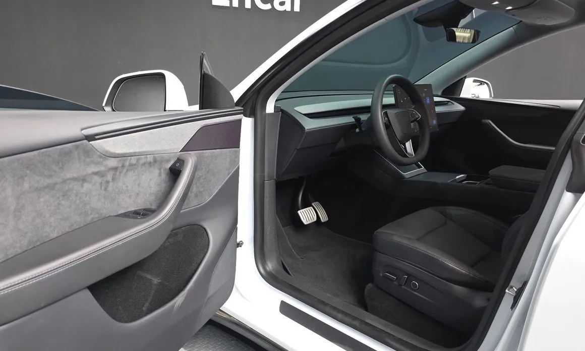 Tesla Model Y — фото 3