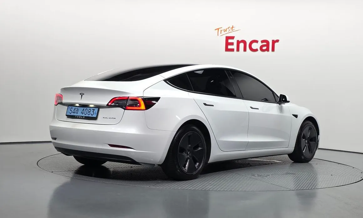 Tesla Model 3 — фото 8