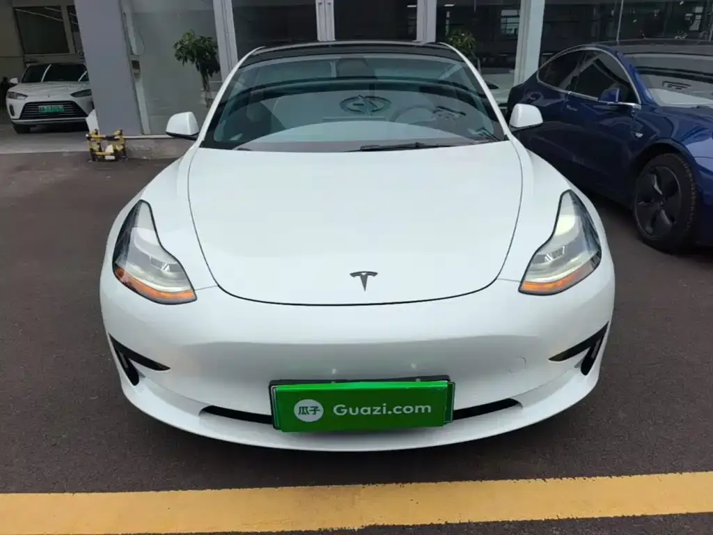 Tesla Model 3 — фото 10