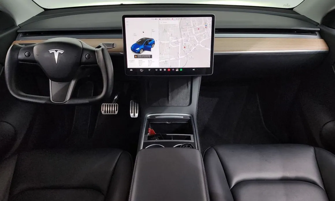 Tesla Model Y — фото 6