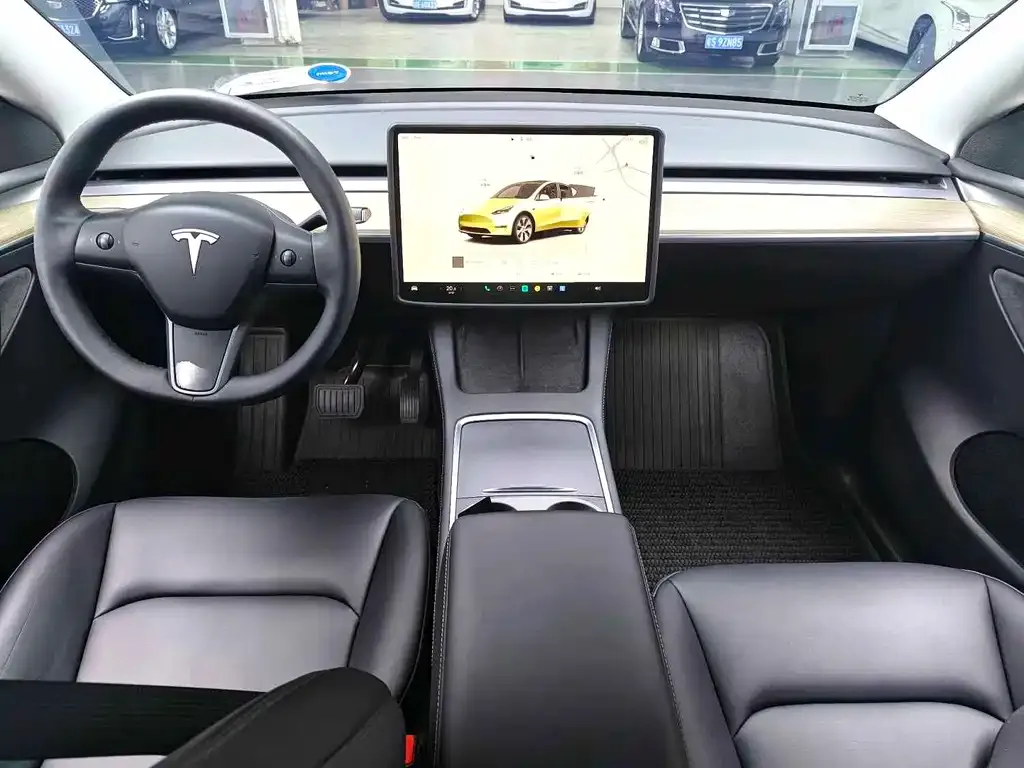Tesla Model Y — фото 5