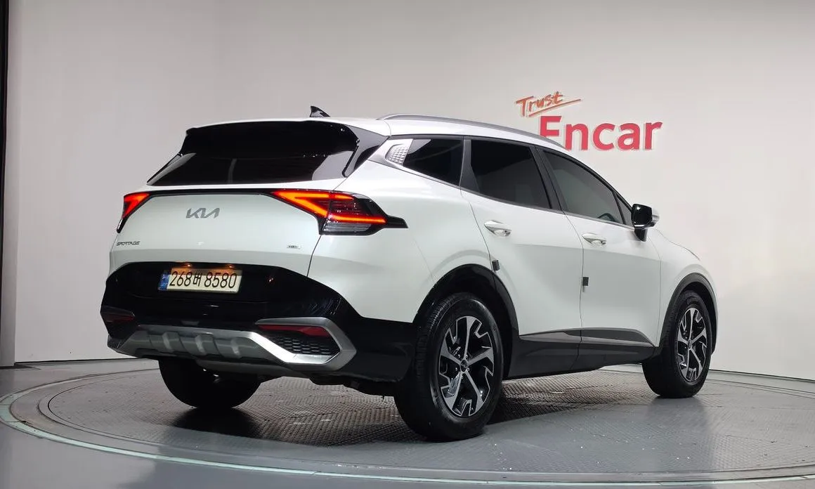 Kia Sportage — фото 10