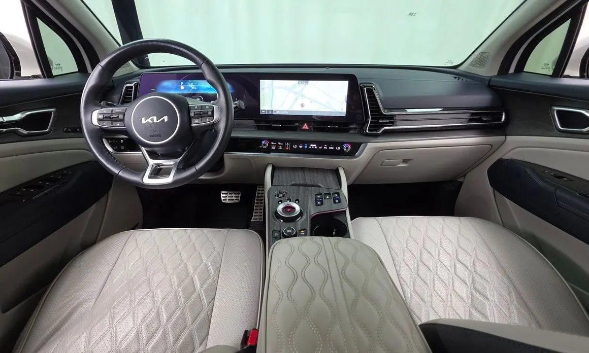 Kia Sportage — фото 9