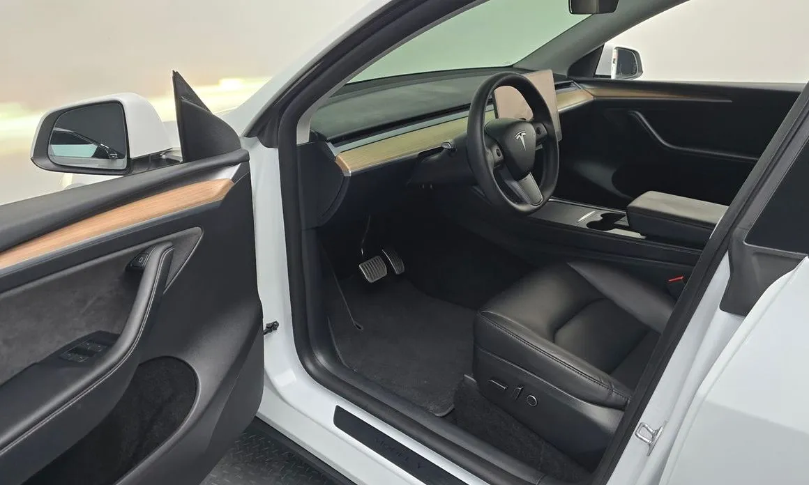 Tesla Model Y — фото 7