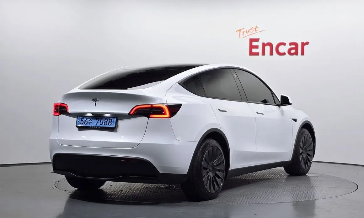 Tesla Model Y — фото 6