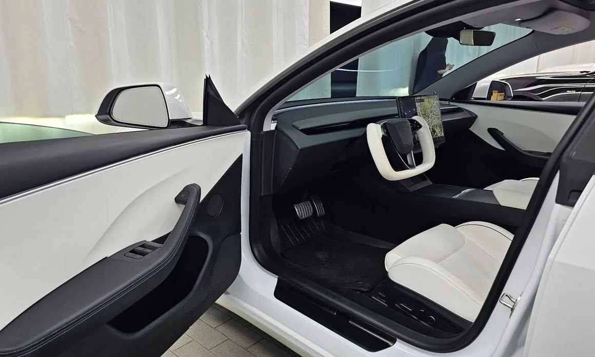 Tesla Model 3 — фото 7