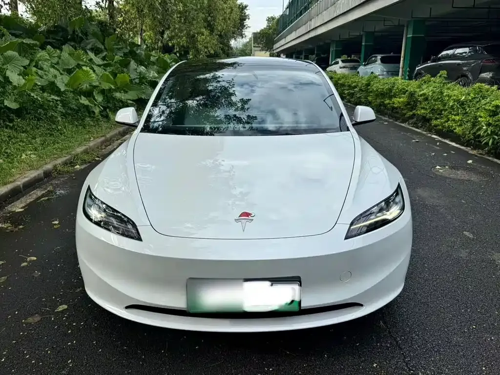 Tesla Model 3 — фото 10
