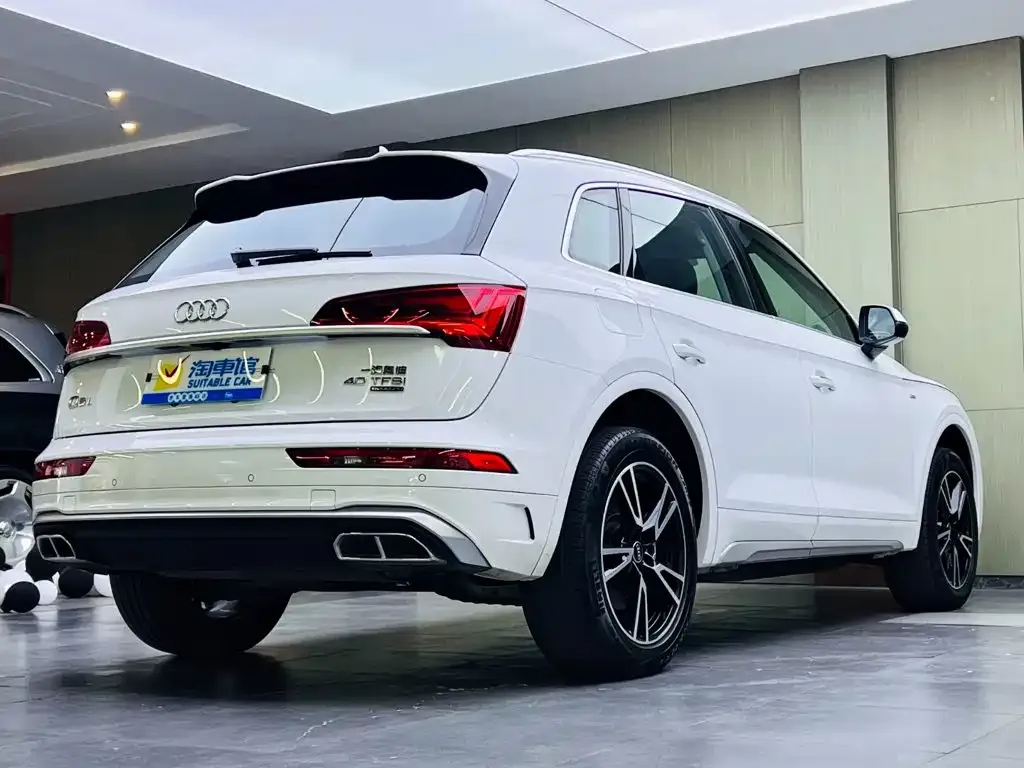 Audi Q5L — фото 5