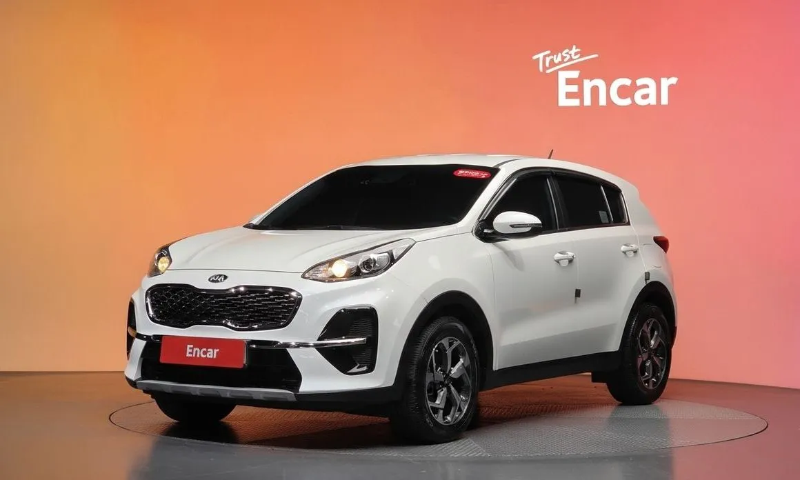 Kia Sportage — фото 1