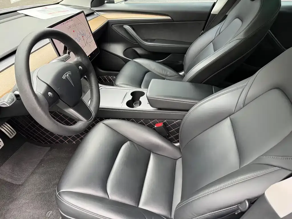 Tesla Model 3 — фото 7