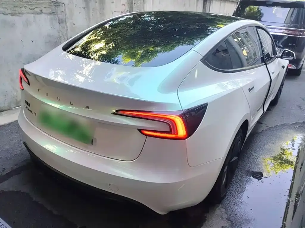 Tesla Model 3 — фото 8