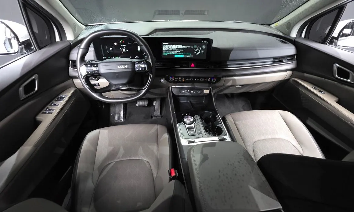 Kia Carnival — фото 10