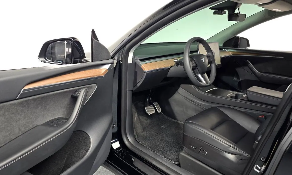 Tesla Model Y — фото 7