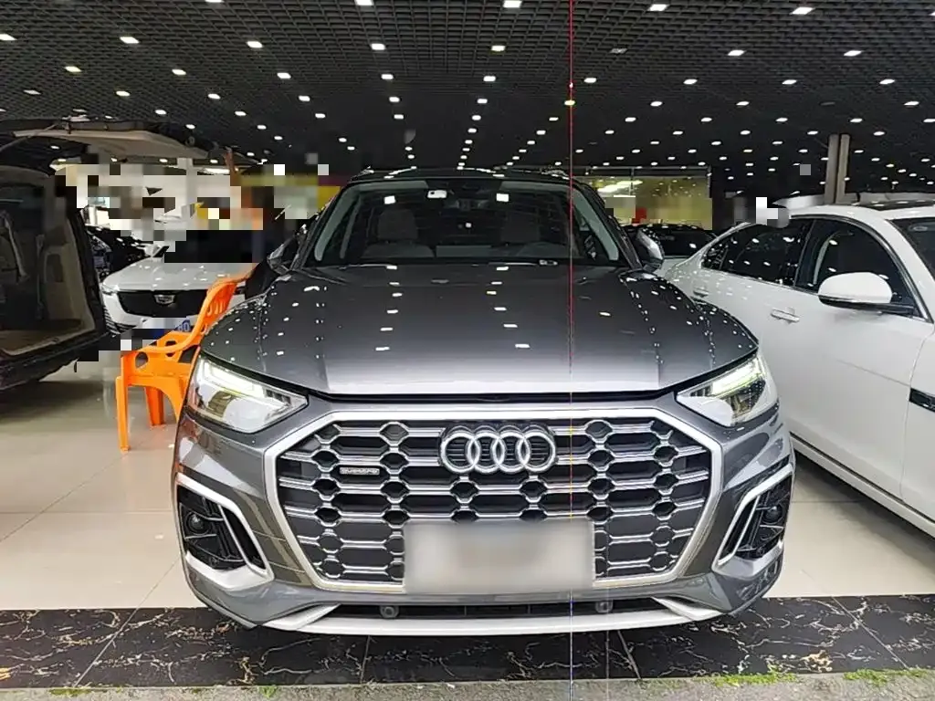 Audi Q5L — фото 5