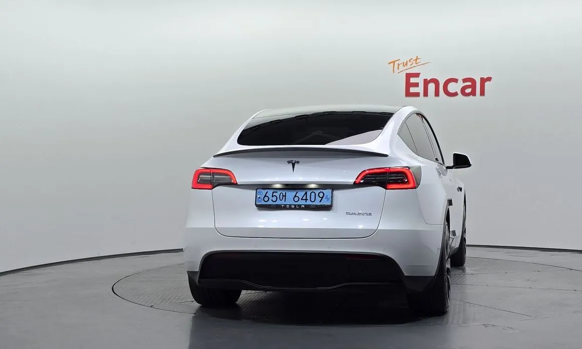 Tesla Model Y — фото 7