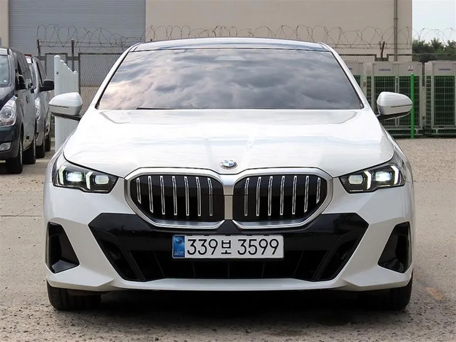 BMW 5-Series — фото 1