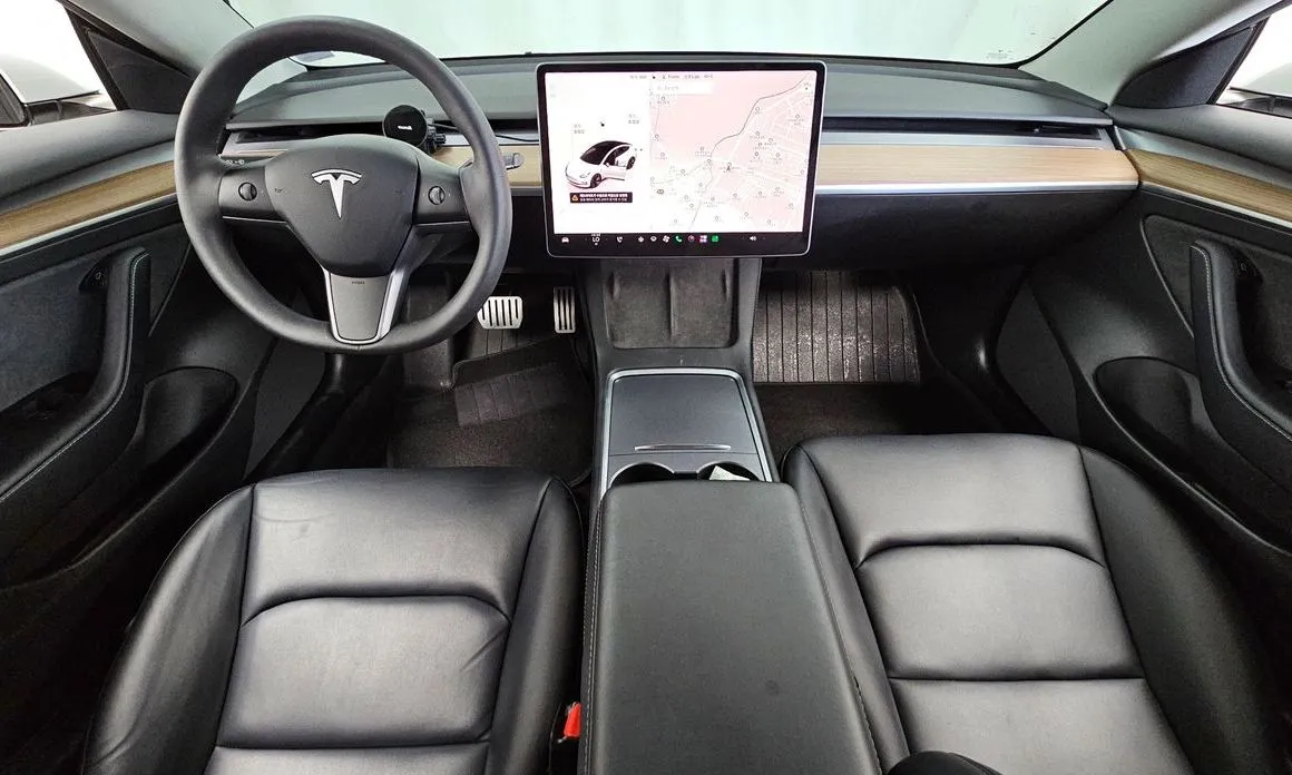 Tesla Model 3 — фото 10