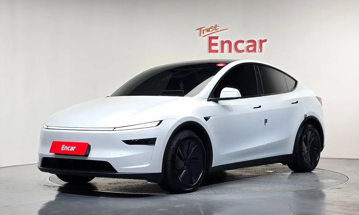 Tesla Model Y — фото 1