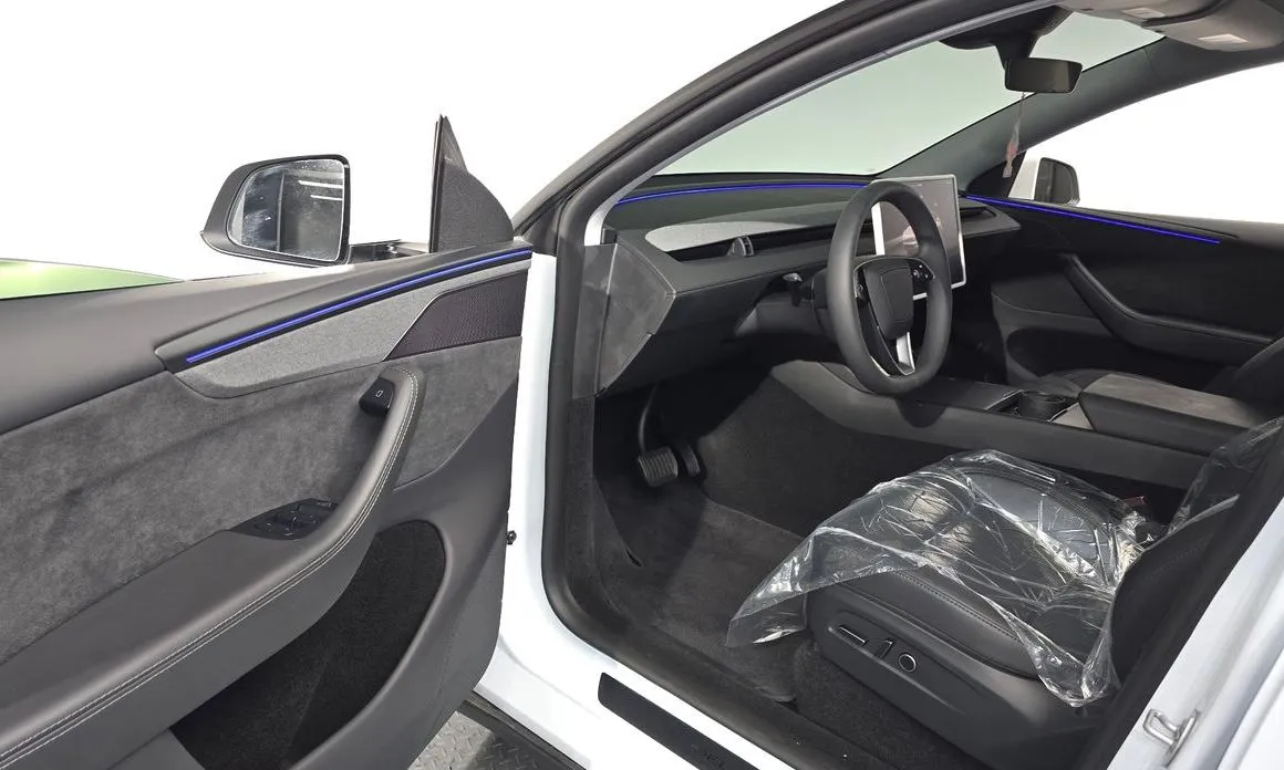 Tesla Model Y — фото 9