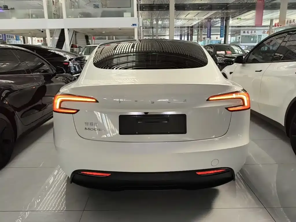 Tesla Model 3 — фото 6