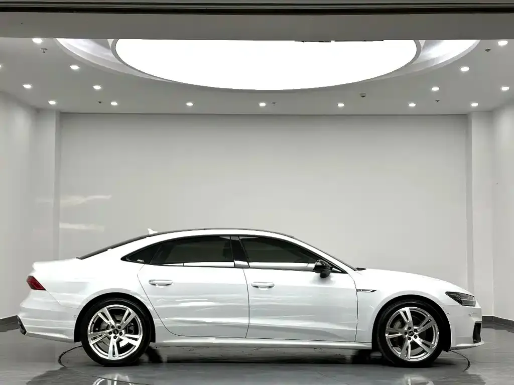 Audi A7L — фото 8