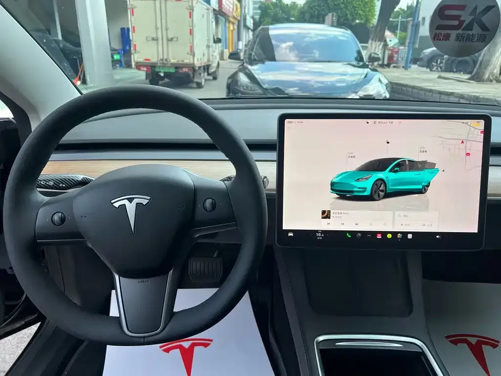 Tesla Model 3 — фото 7