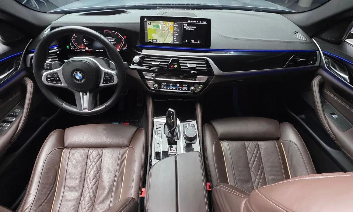 BMW 5-Series — фото 10