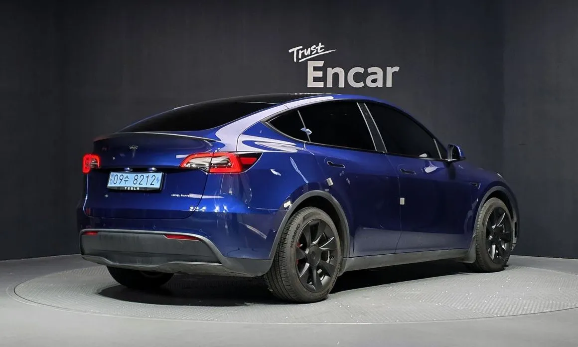 Tesla Model Y — фото 5
