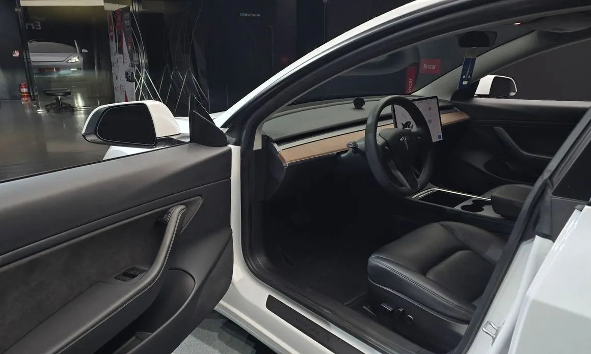 Tesla Model 3 — фото 6