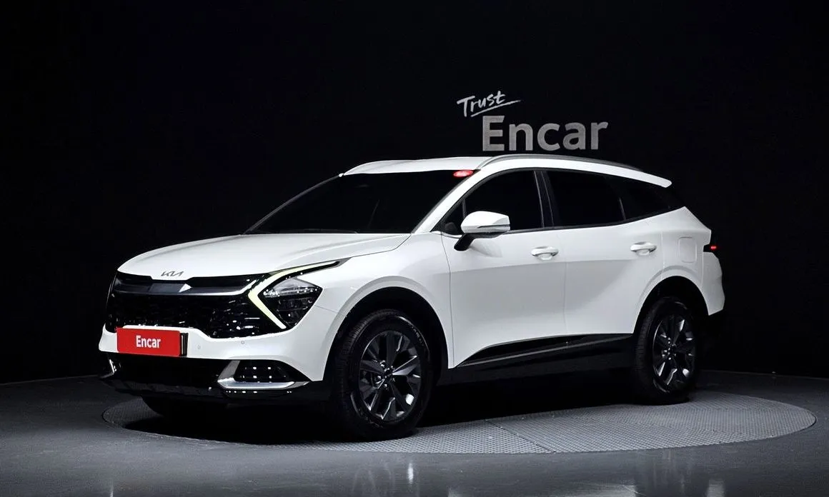 Kia Sportage — фото 1