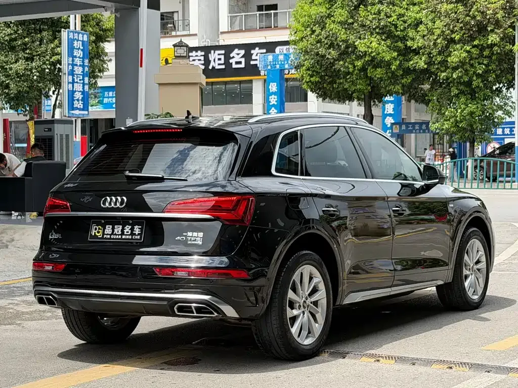 Audi Q5L — фото 5