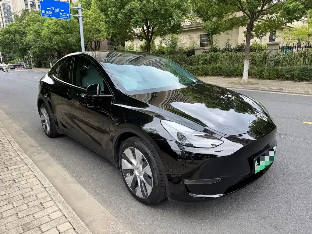 Tesla Model Y — фото 7