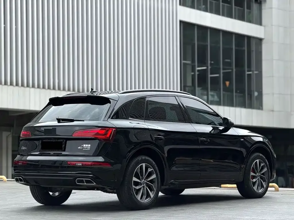 Audi Q5L — фото 7